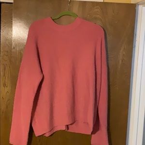 Rose color sweater with buttons down the back